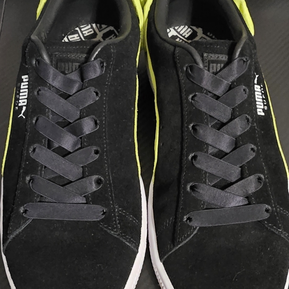Black and green with bow womens puma shoes size 9.5